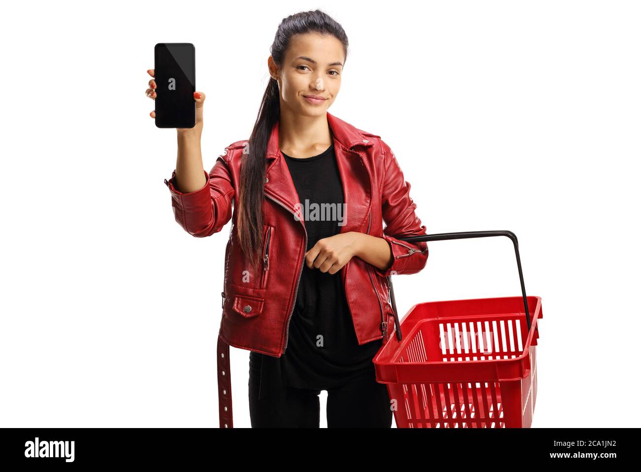 Female customer with a shopping basket showing a smartphone isolated on white background Stock Photo