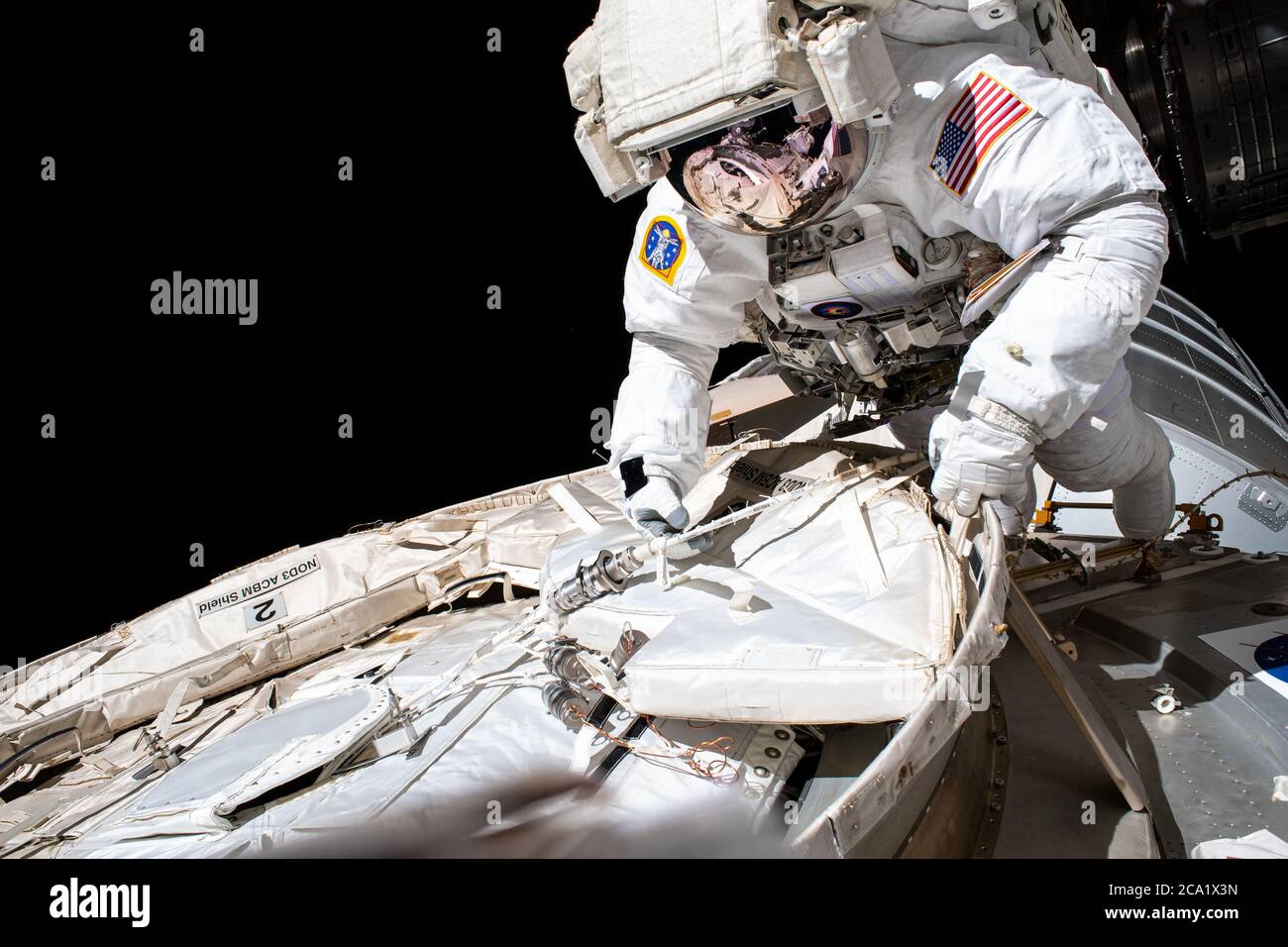 NASA astronaut and Expedition 63 Commander Chris Cassidy conducts a ...