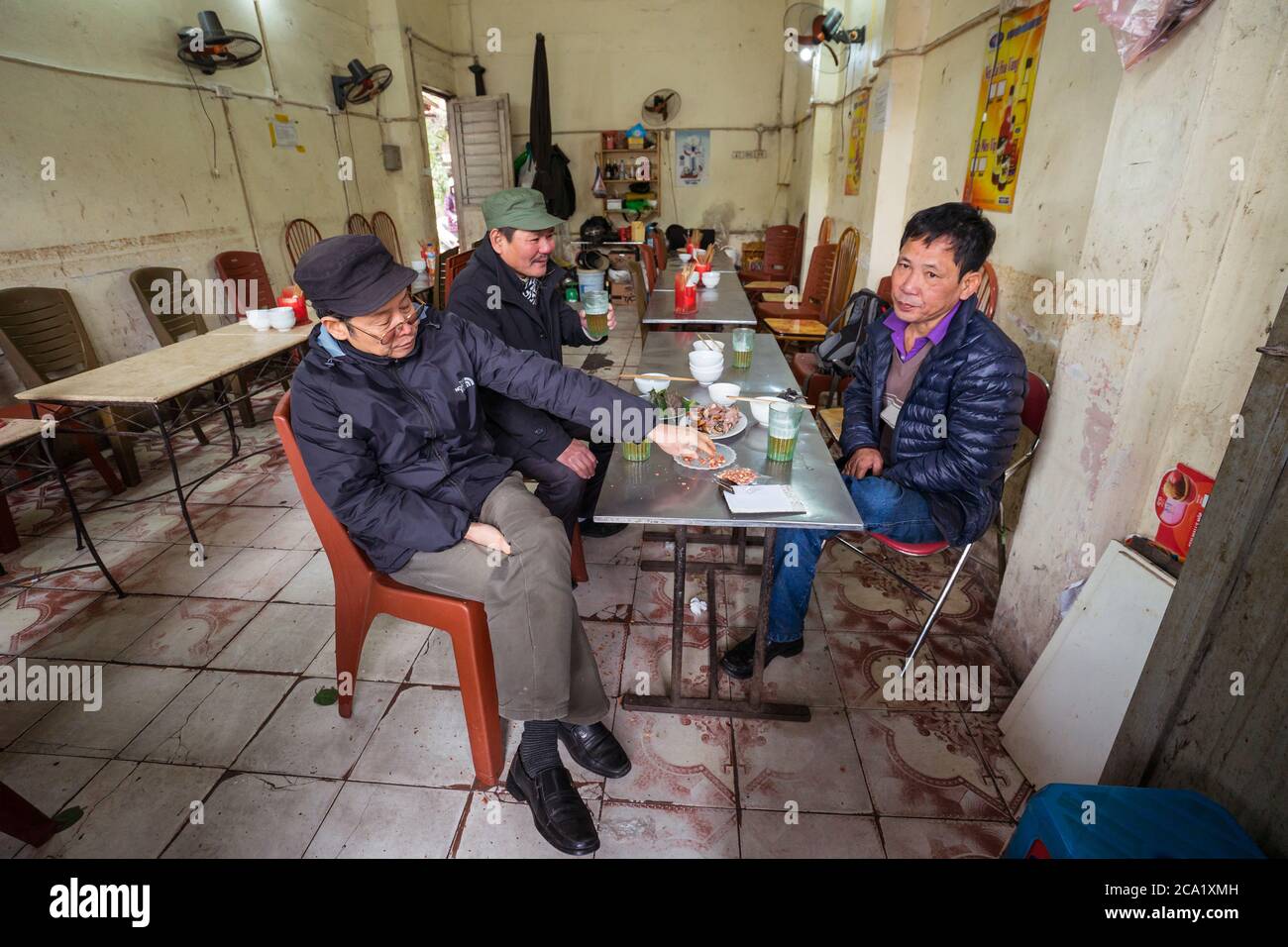 Hanoi / Vietnam January 21, 2020 group of vietnamese men drinking