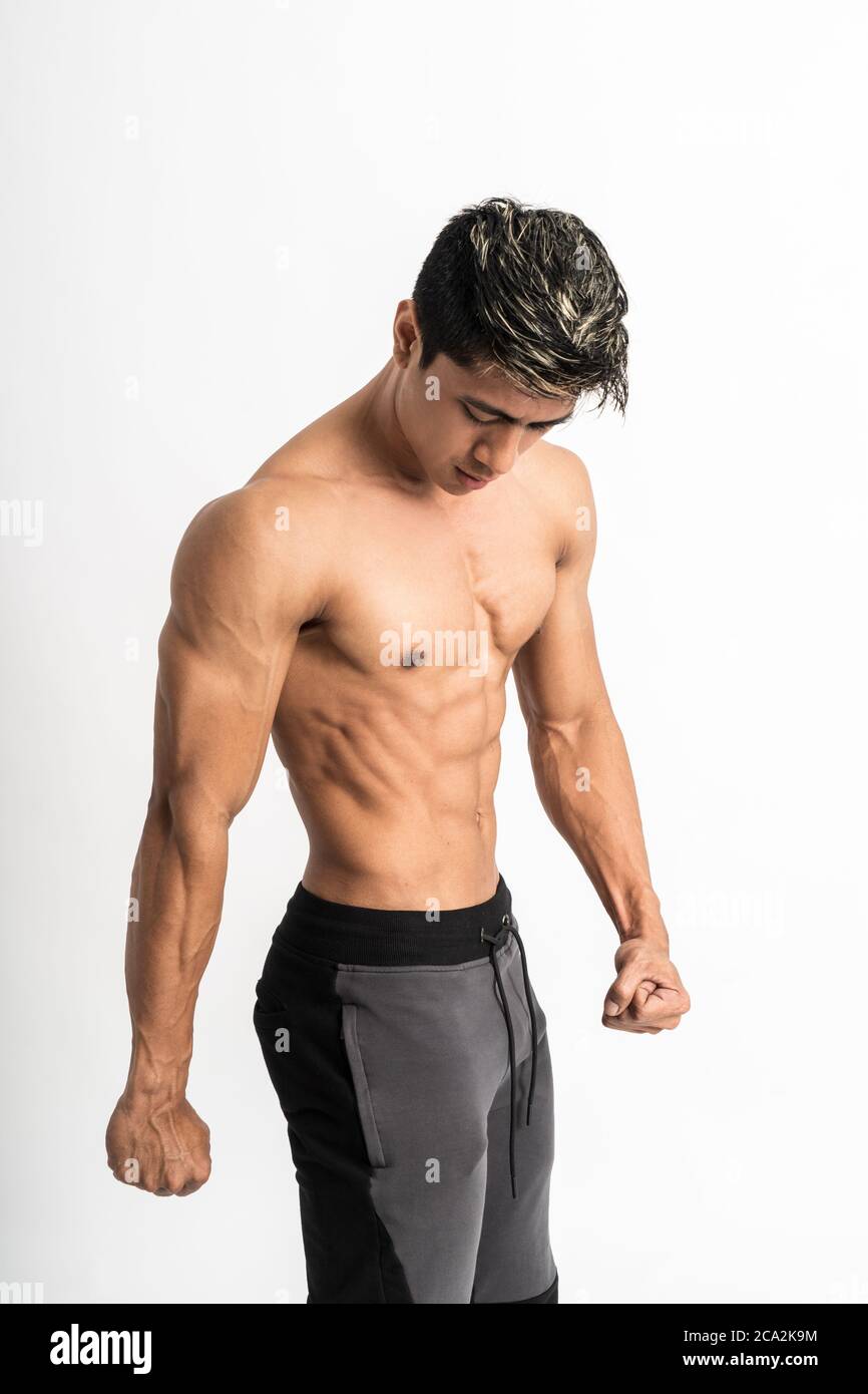 Premium Photo  Half body image of young man showing muscular body