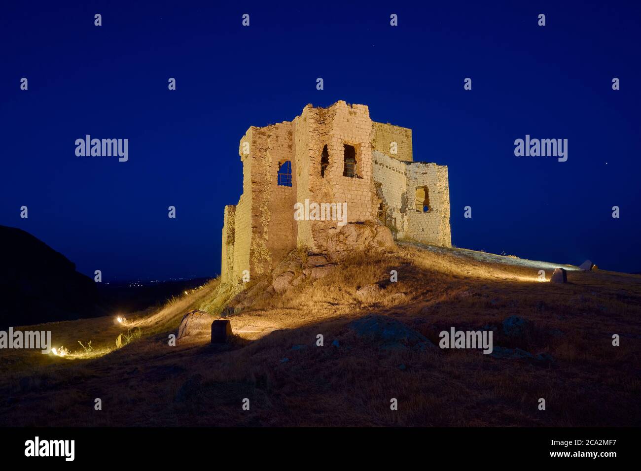 ruins of La Estrella castle in Teba at night, Malaga. Andalusia, Spain Stock Photo