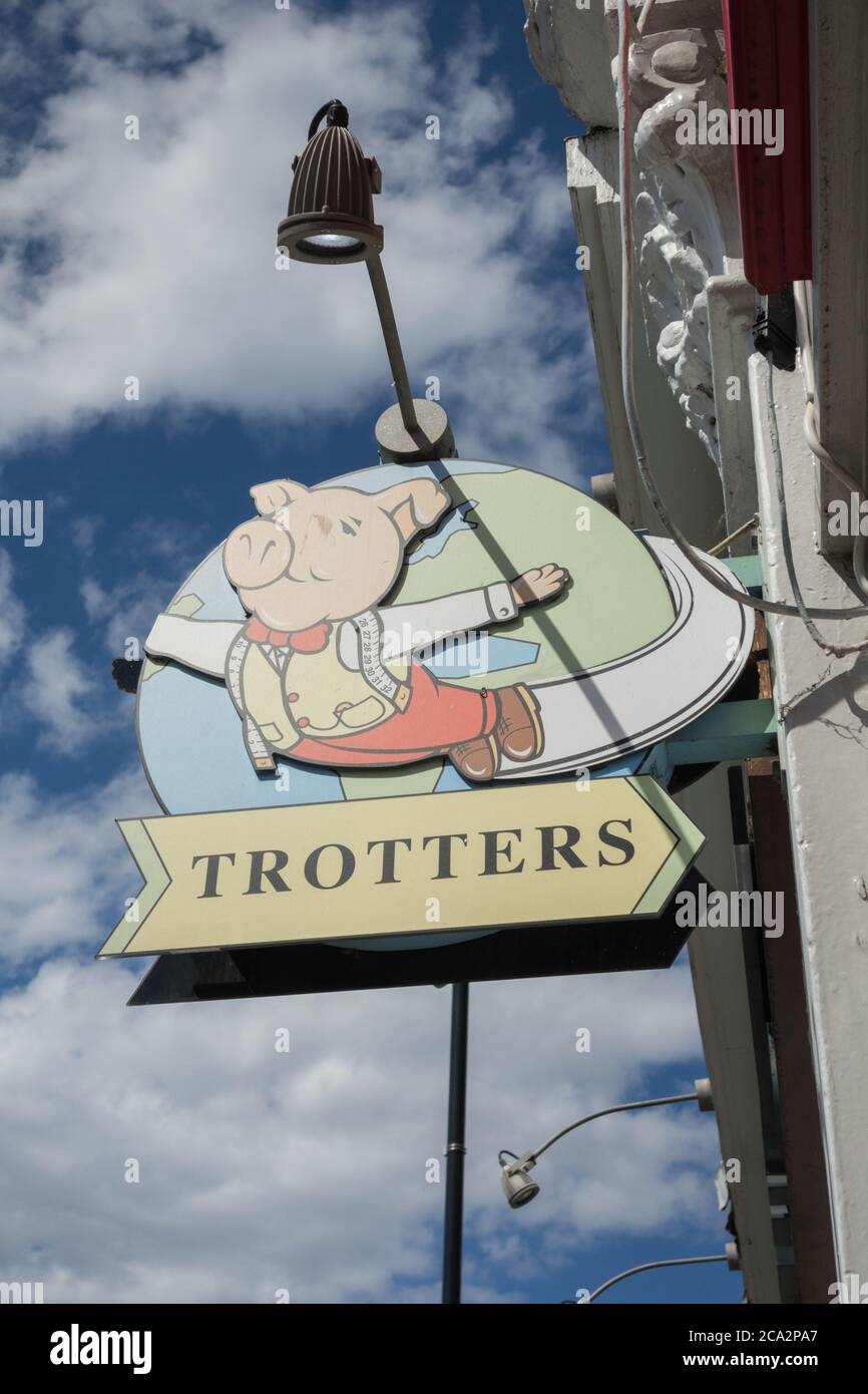 Closeup of Trotters Childrenswear & Accessories signage outside one of their outlets in west London, UK Stock Photo