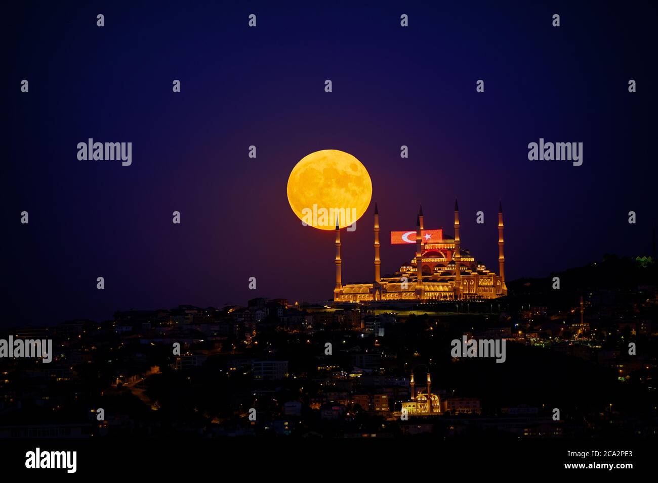 Camlica Mosque with a perfect evening full moon view from Istanbul. Stock Photo