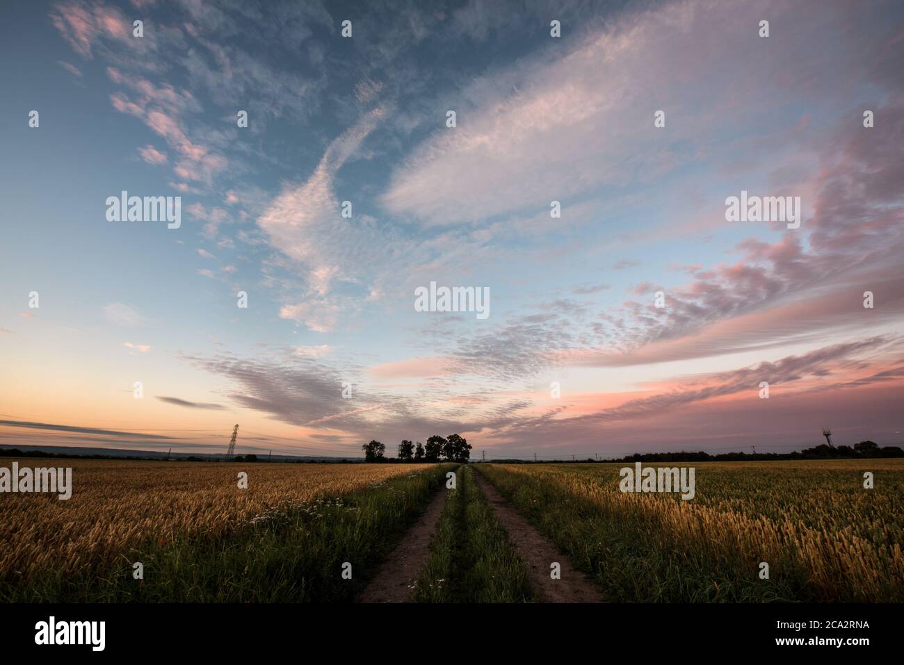 Dawn colours over Bingham, Nottinghamshire, with parts of the UK looking set for a scorching weekend and temperatures that could reach 36C. Stock Photo
