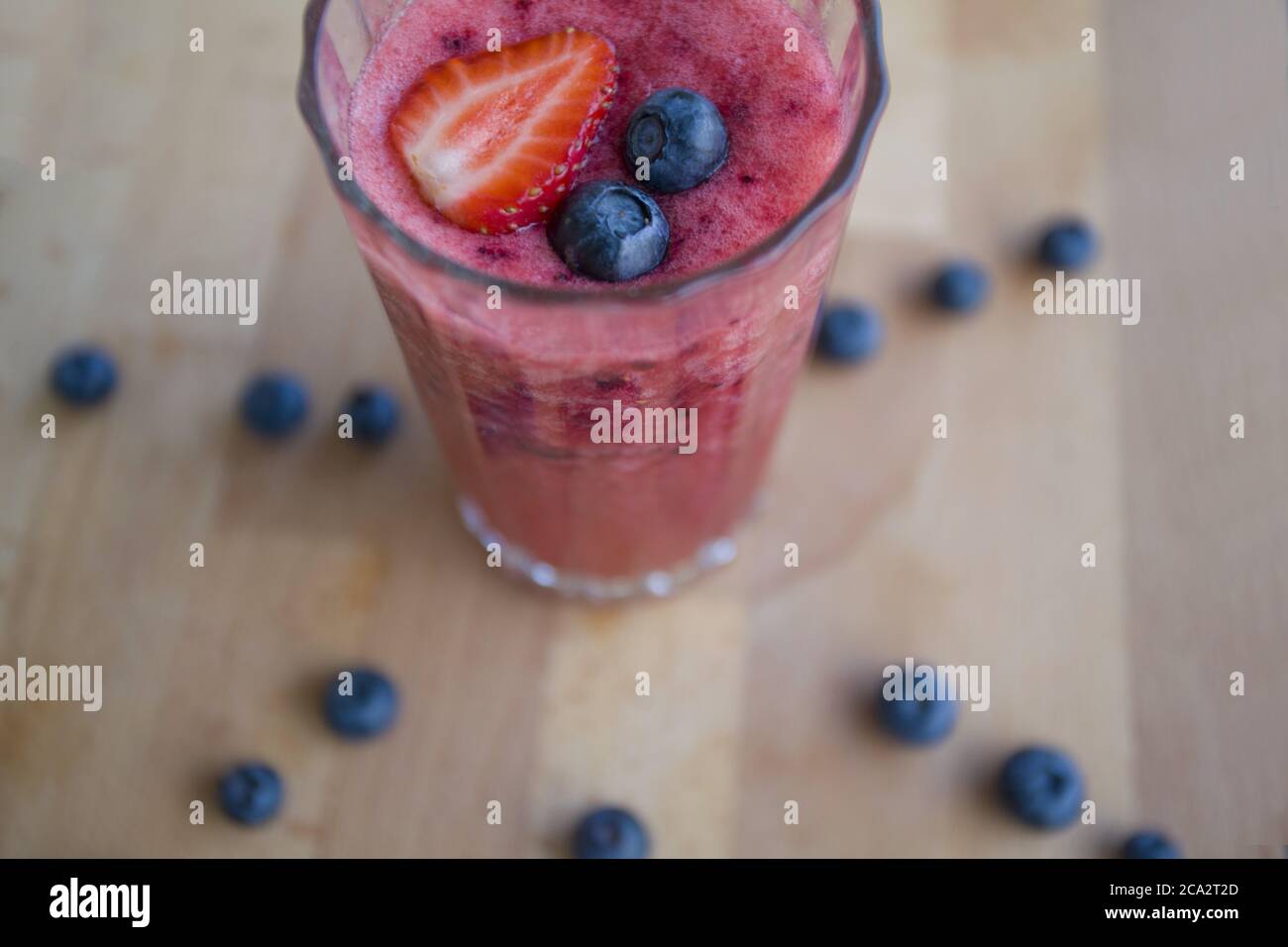 Healthy strawberry and blueberry smoothie Stock Photo Alamy