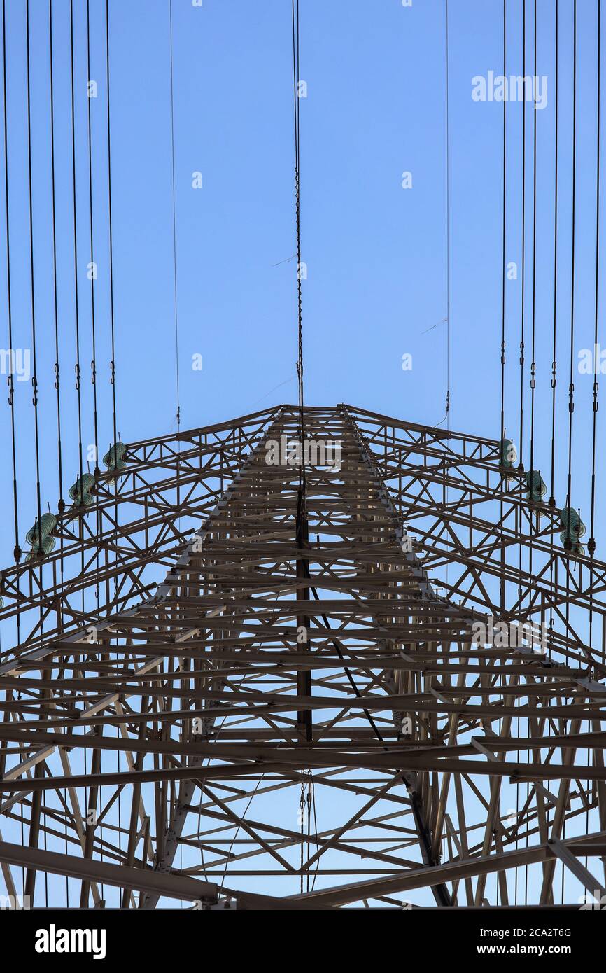 Very High Voltage Electric Tower with blue sky Stock Photo - Alamy