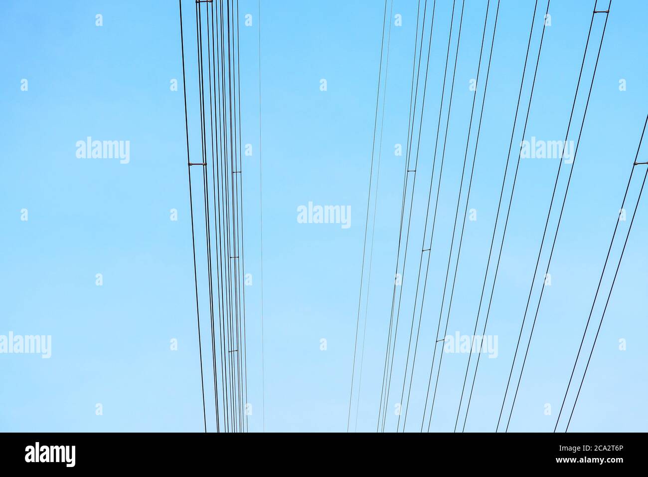 Very High Voltage Power Lines cable in blue sky insulated Stock Photo ...