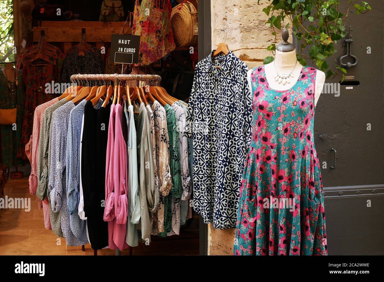 Summer clothes on sale in midJuly Stock Photo Alamy