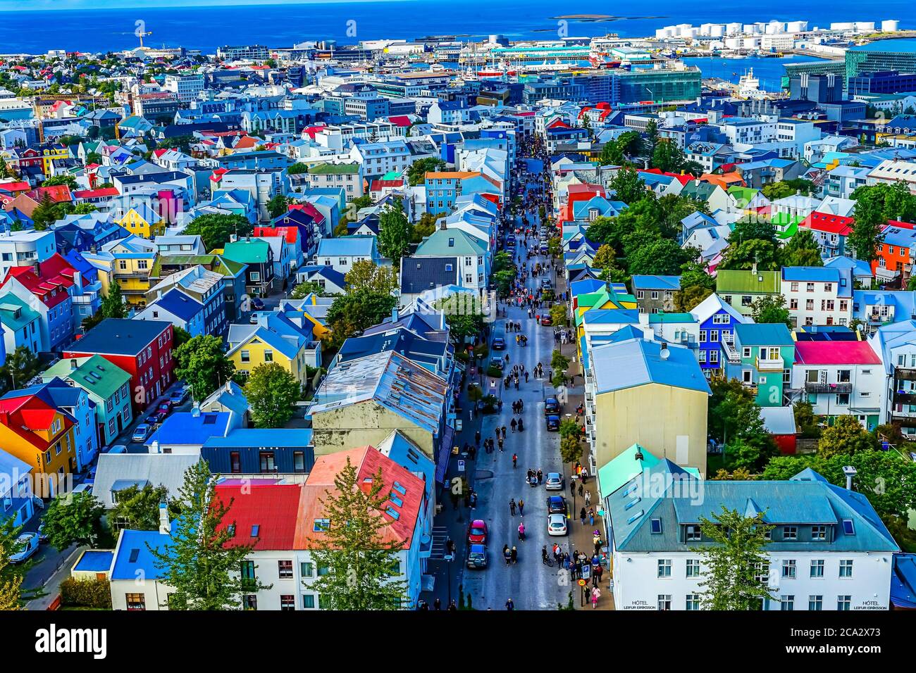 Colorful Red Blue Green Houses Cars Shopping Streets Harbor Reykjavik Iceland. Stock Photo