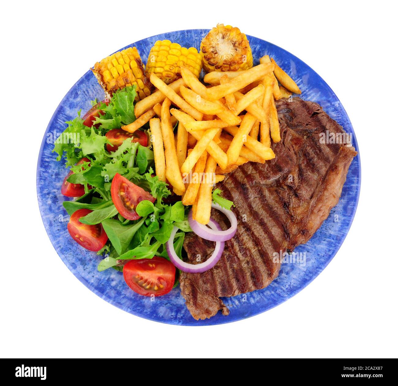 Grilled sirloin steak and French fries meal with fresh salad and