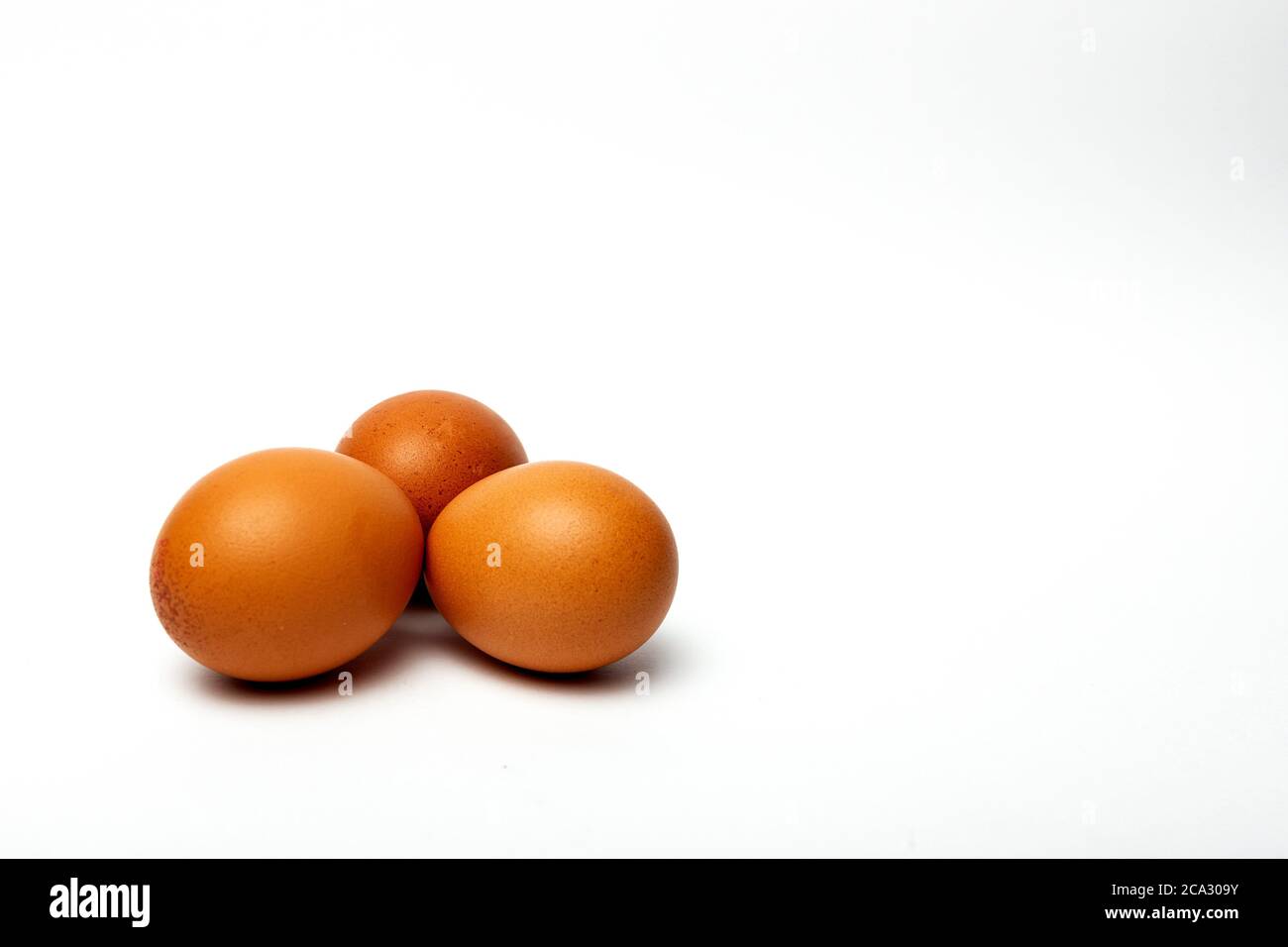 Raw eggs on white background. Isolated Stock Photo Alamy