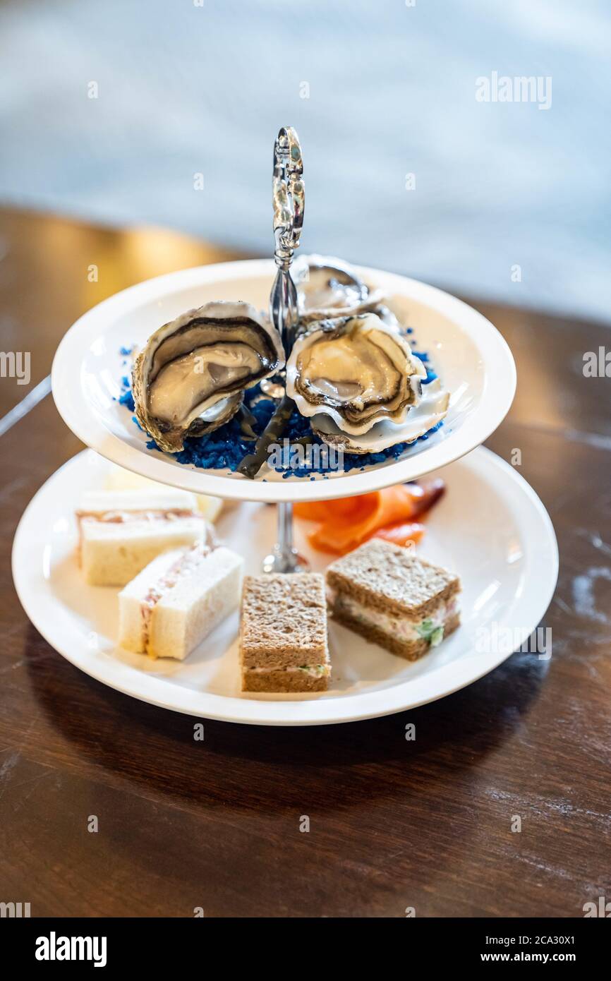 cocktail Canapes dish, Fresh Oyster and smoked salmon seafood