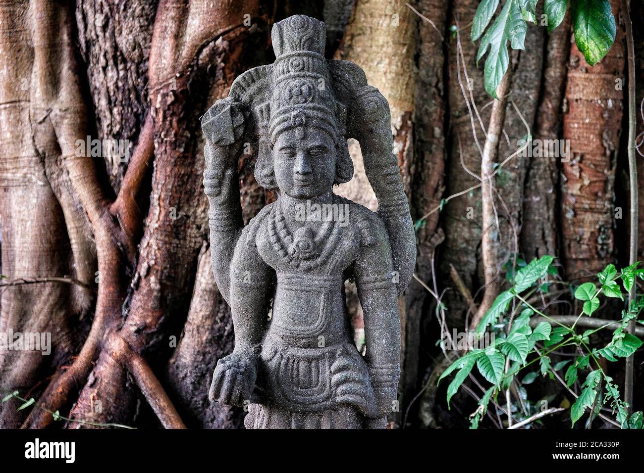 Hindu statue located in front of the Peruvaram Mahadeva temple at ...