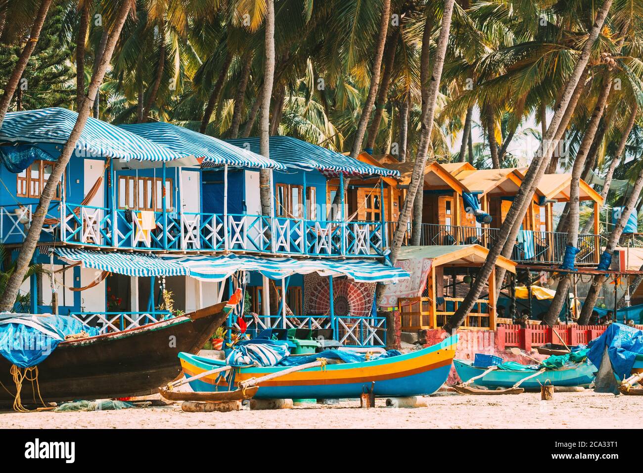 Canacona, Goa, India. Fishing Boat And Famous Painted Guest Houses On