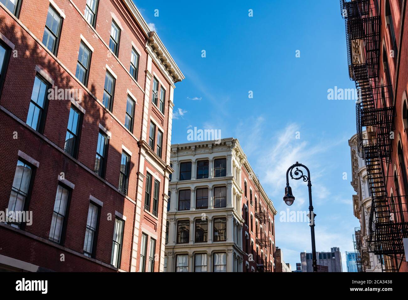 Typical buildings in Soho Cast Iron historic District in New York City. Greene Street. Stock Photo