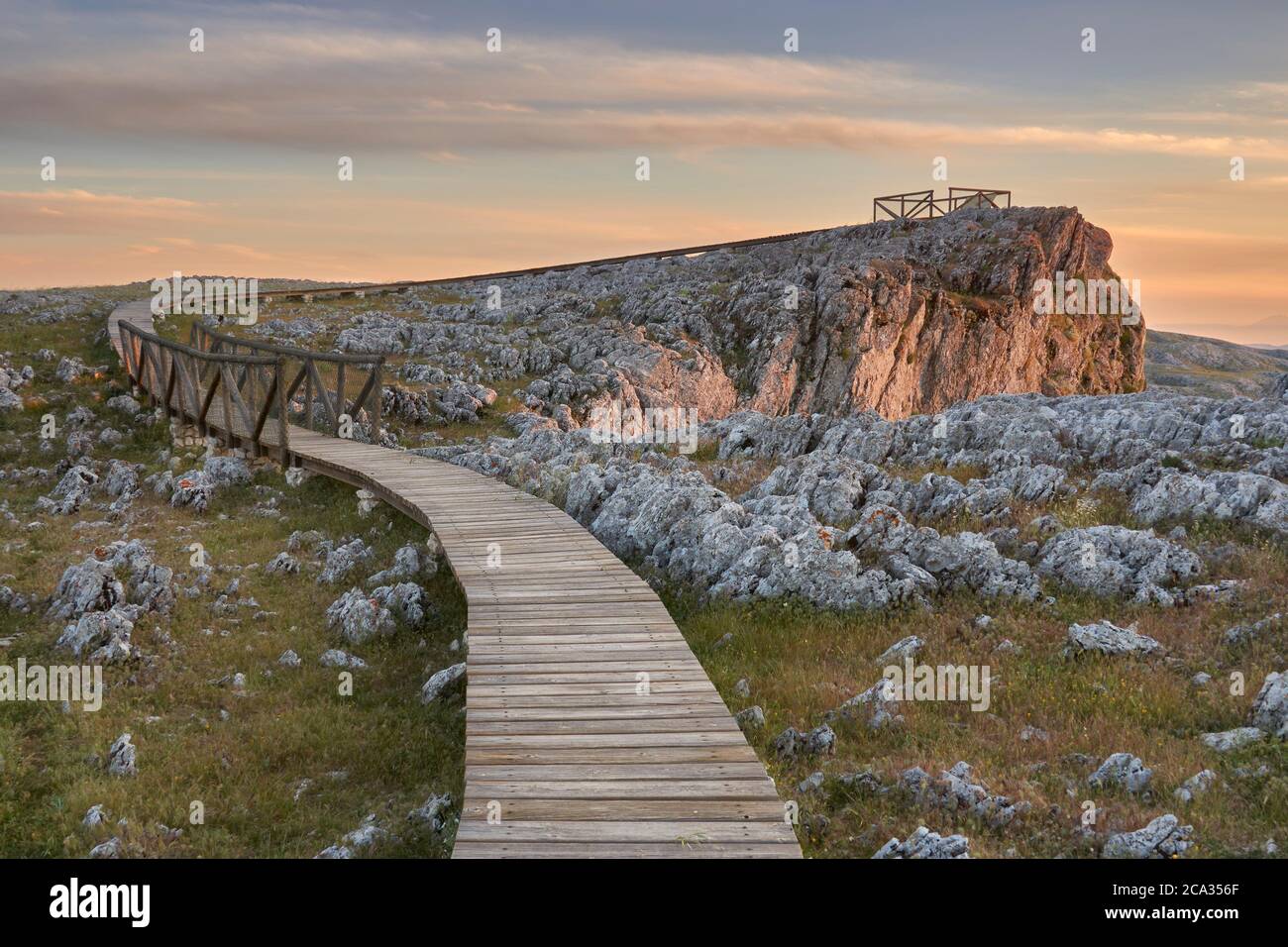 Wooden walkway for public use over the limestone rock landscape in Loja, Granada. Spain. Stock Photo