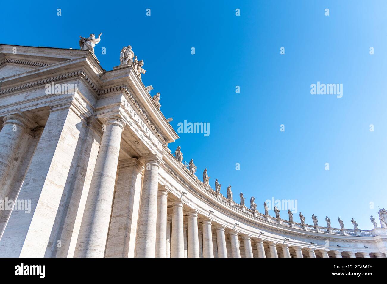 Statues on the top of st peters basilica hires stock photography and