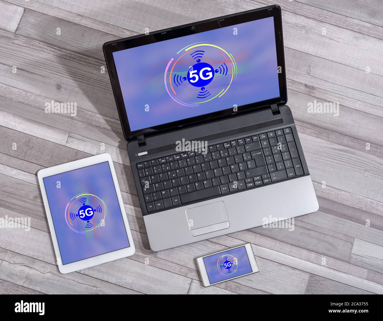 5g concept shown on different information technology devices Stock Photo