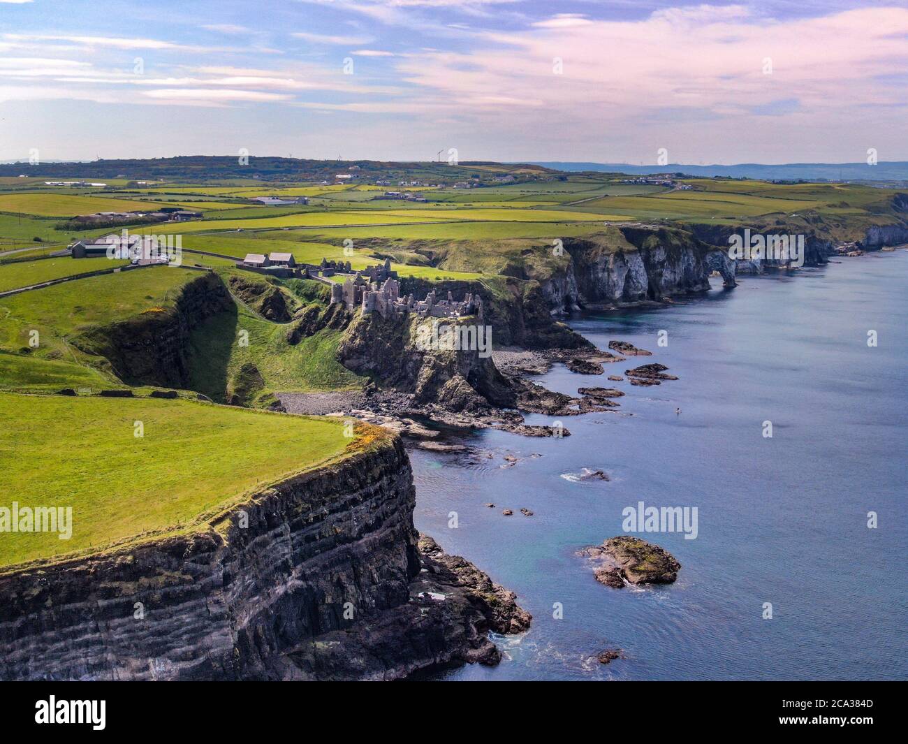Dunluce Castle in Northern Ireland - a famous movie location - aerial photography. Stock Photo