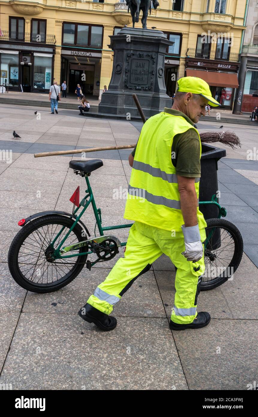 alamy stock photo man sweeping up street new york alamy stock photo man sweeping up street new york