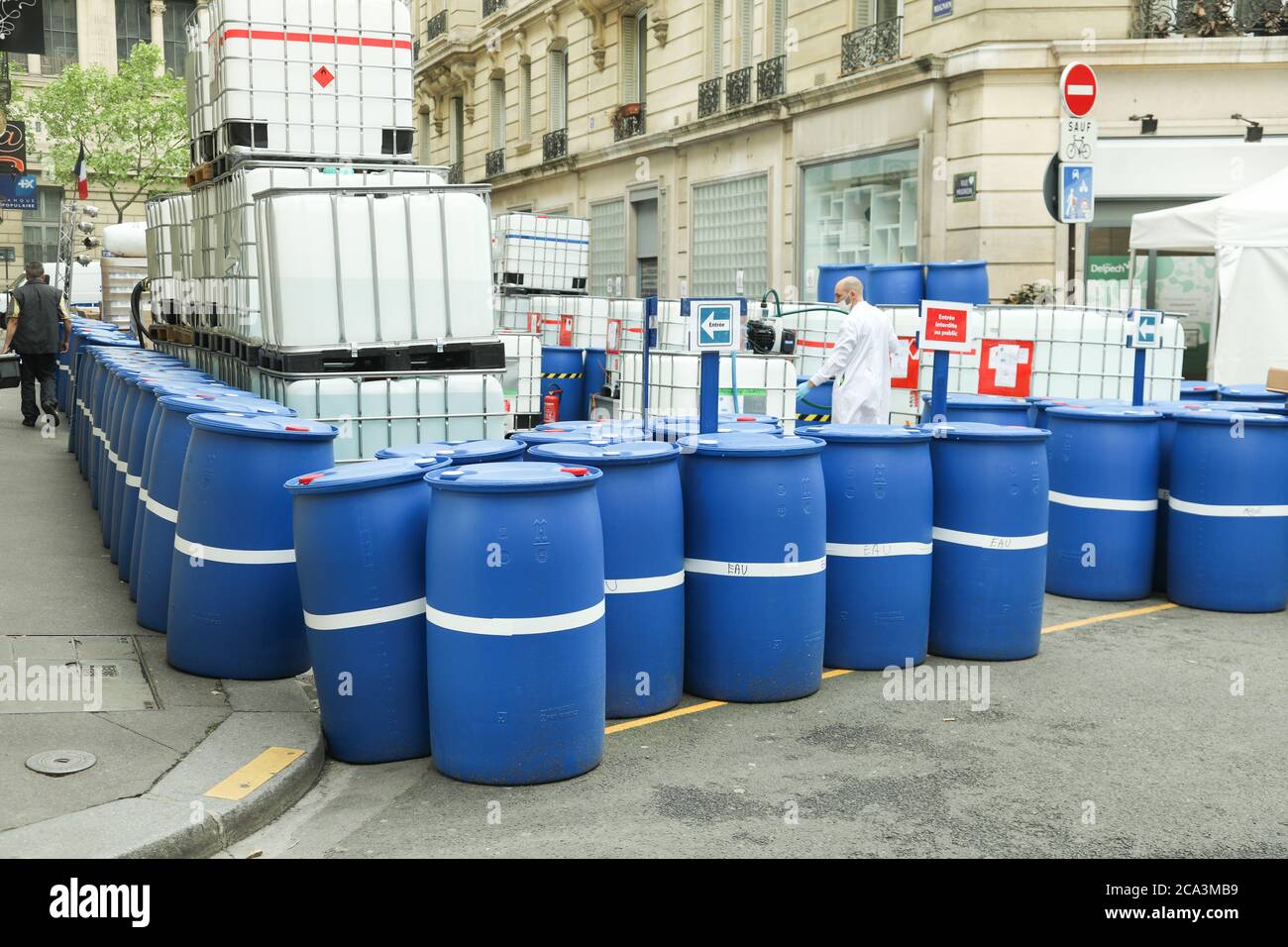 Chemical Plant, Plastic Storage Drums outdoor toxic barrel Stock Photo