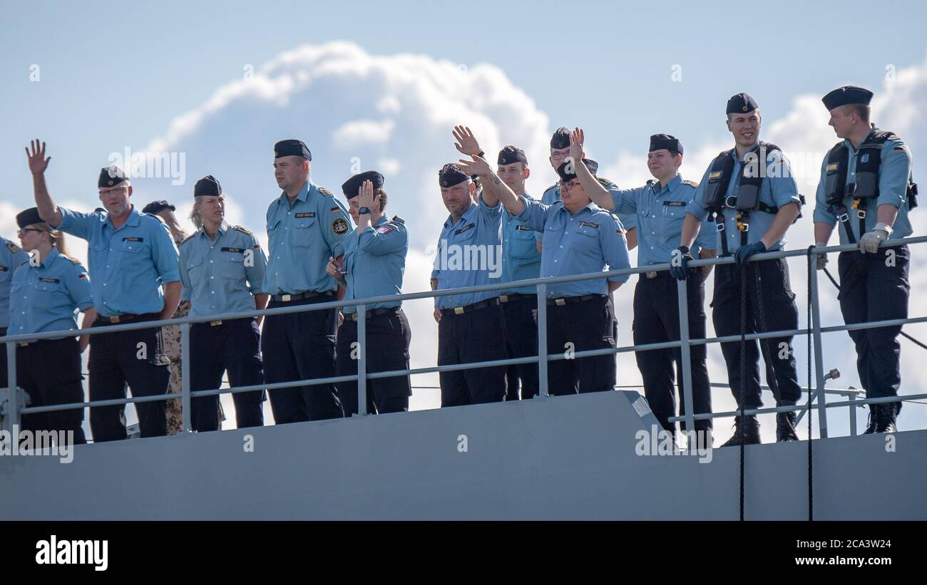 Wilhelmshaven, Germany. 04th Aug, 2020. The crew of the frigate 'Hamburg' waves when leaving. The frigate has sailed off the coast of the civil war-torn country Libya for a five-month Mediterranean mission as part of the European Union's Irini foreign mission. Credit: Sina Schuldt/dpa/Alamy Live News Stock Photo