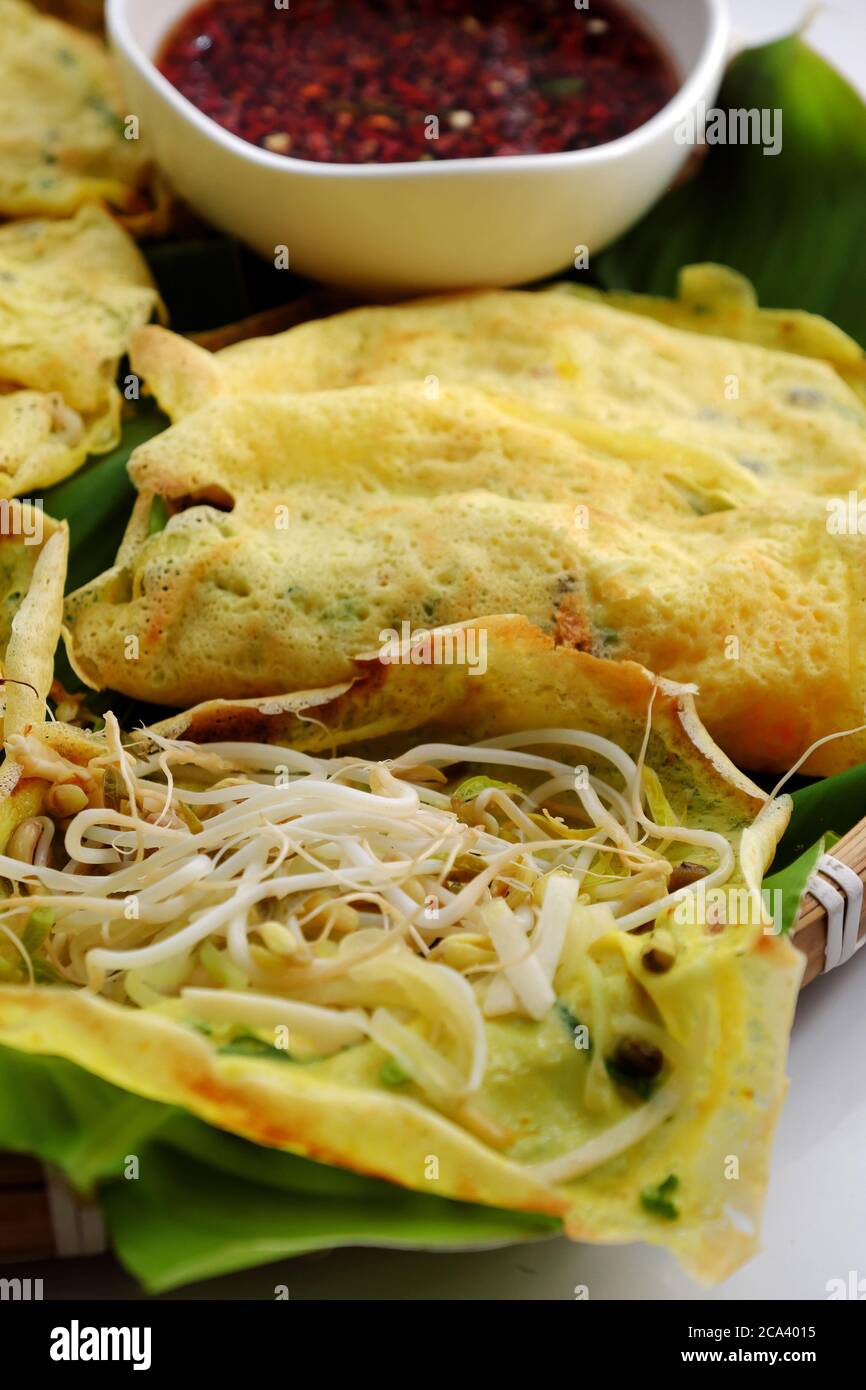 tray of homemade vegan food, Vietnamese pancake from rice flour, bean
