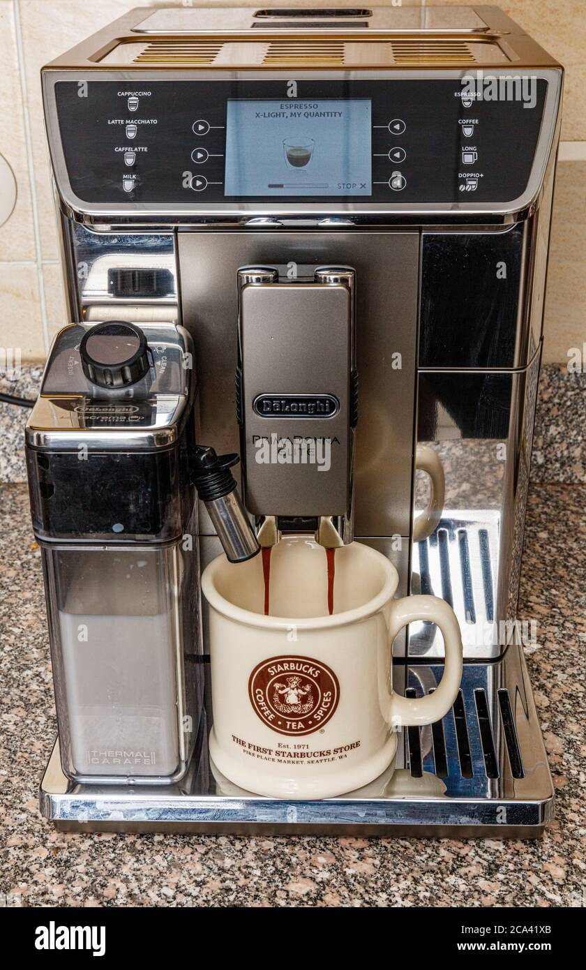 home coffee making from DeLonghi Prima Donna Elite espresso maker Stock  Photo - Alamy