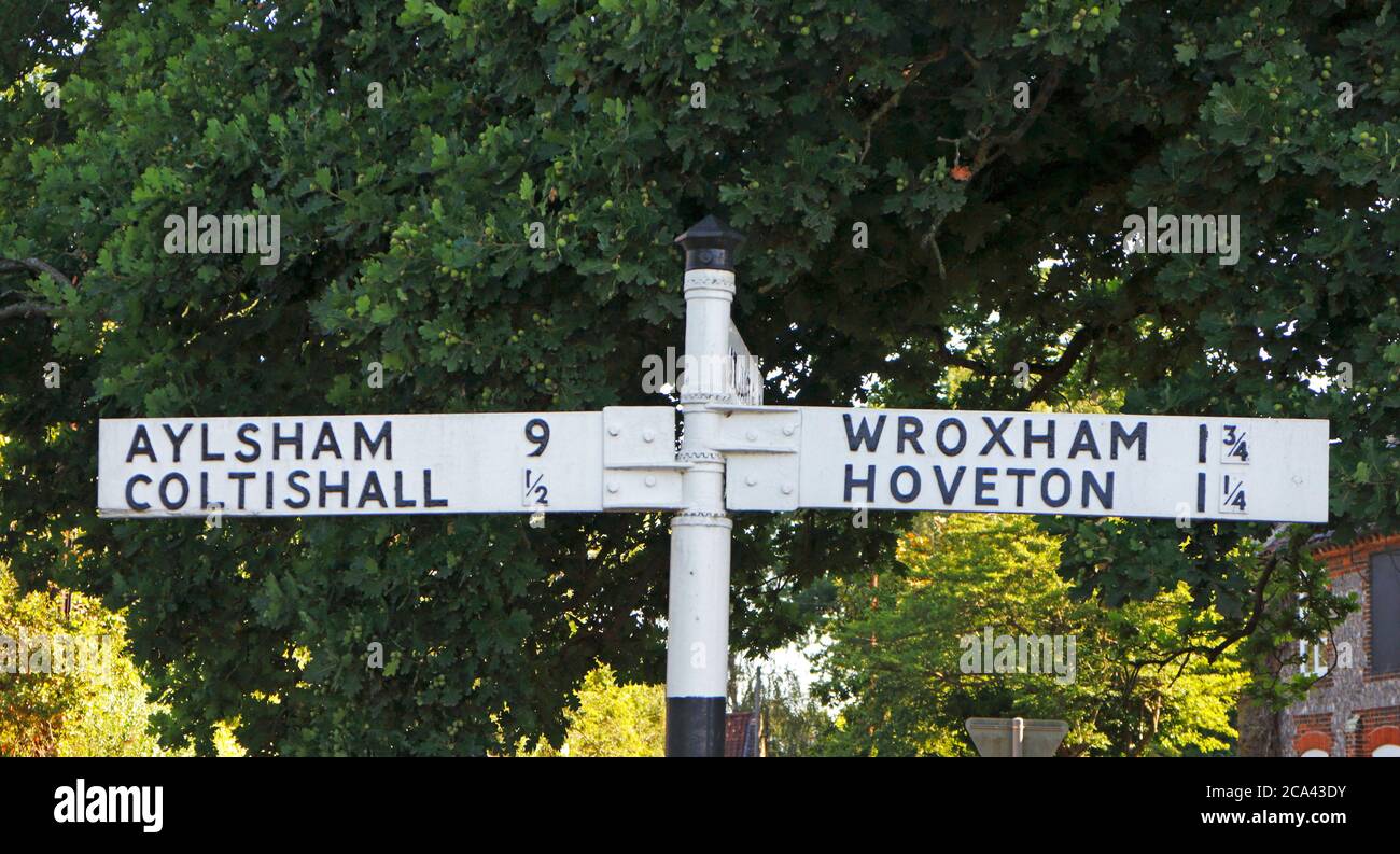 A traditional road sign on the B1354 road at Coltishall, Norfolk, England, United Kingdom. Stock Photo