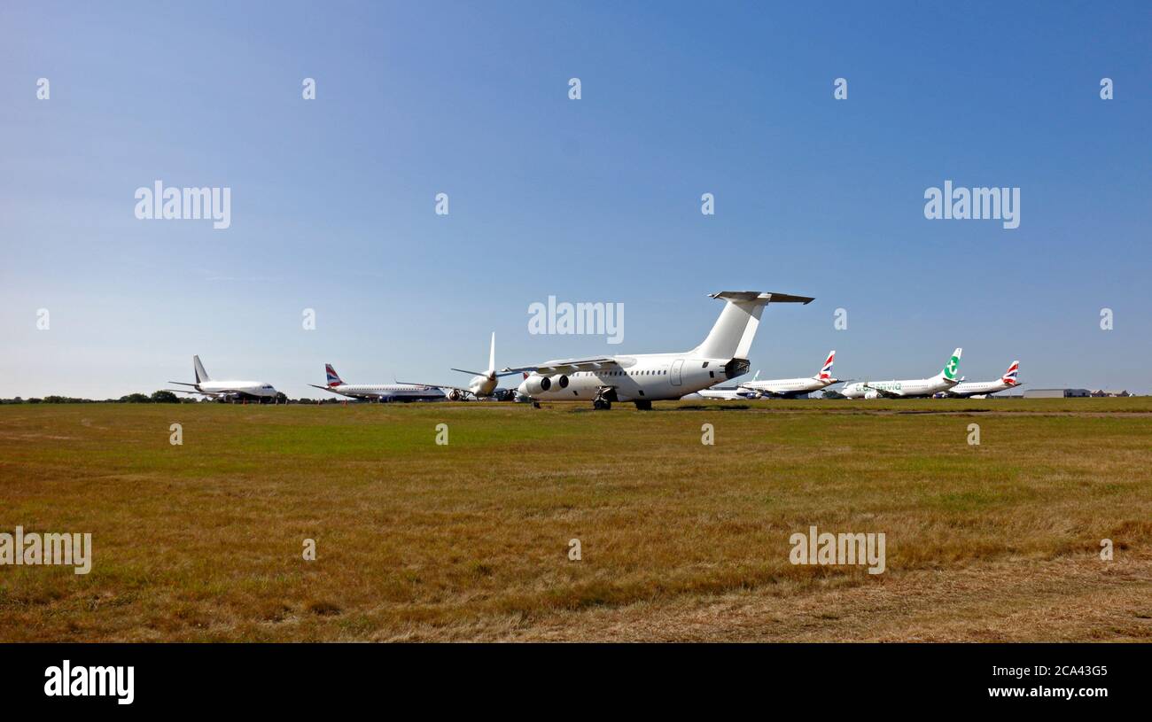 Passenger aircraft grounded at Norwich International Airport during the Coronavirus outbreak at Norwich, Norfolk, England, United Kingdom. Stock Photo