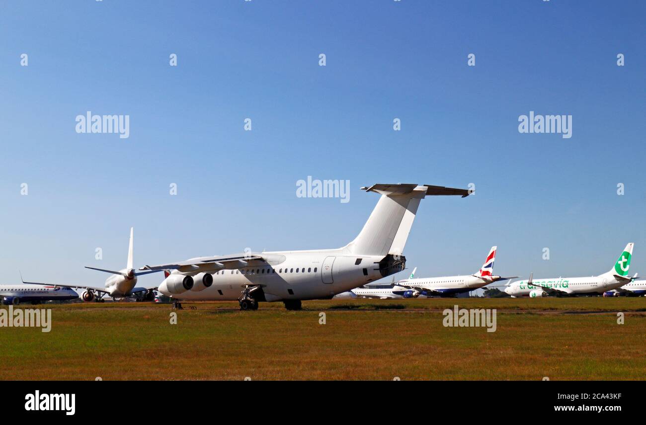 Passenger aircraft grounded at Norwich International Airport during the Coronavirus outbreak at Norwich, Norfolk, England, United Kingdom. Stock Photo