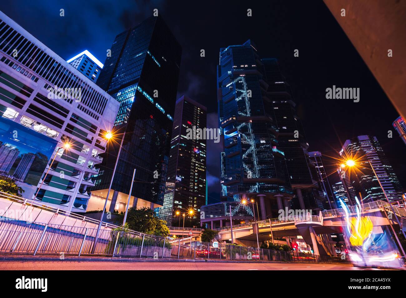 Night cityscape with colorful lights on the street of Hong Kong city central district Stock Photo