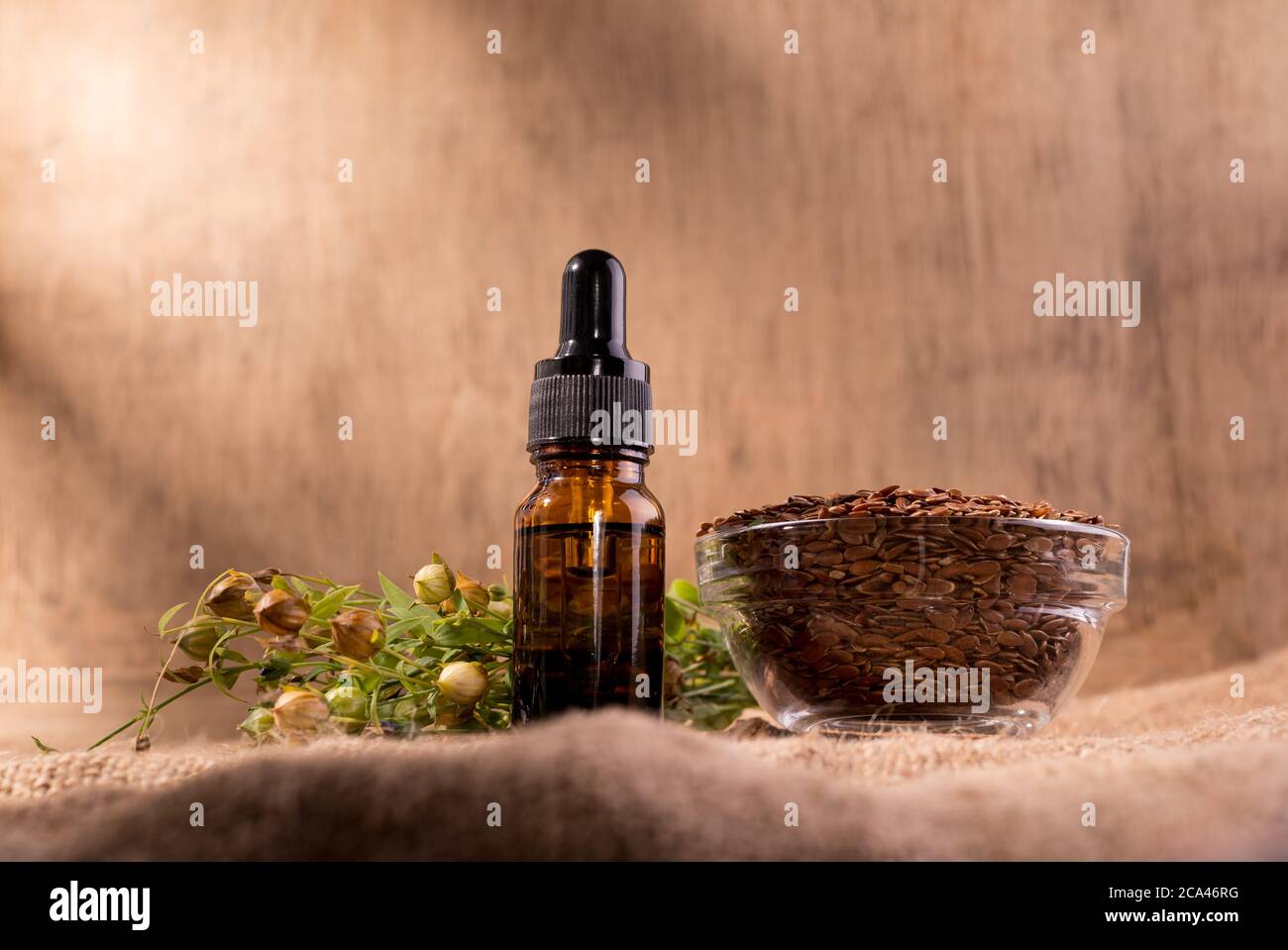 Flaxseed oil cosmetic bottle. Composition with dispenser bottle, flax