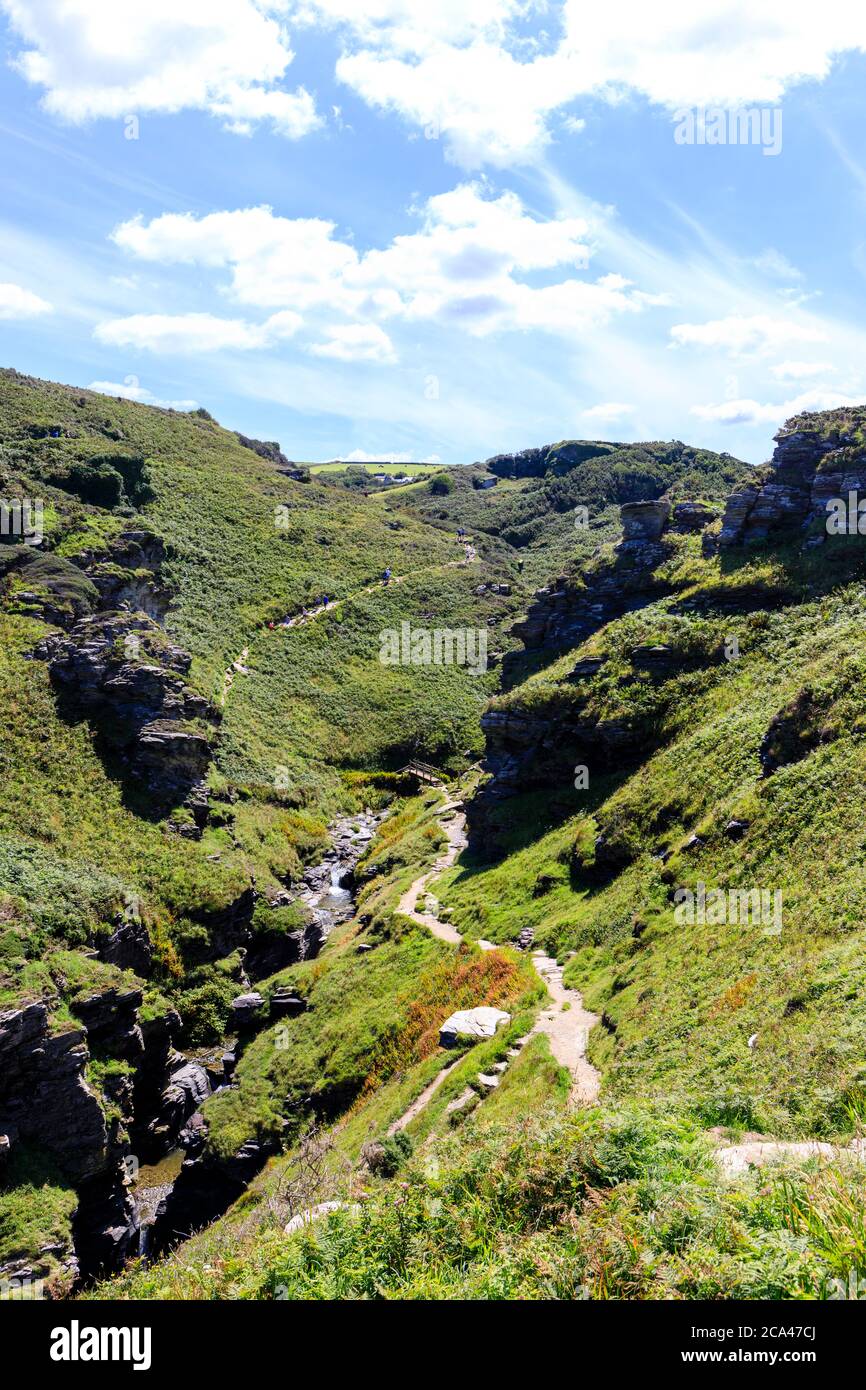 Steep climb down to Rocky Valley and even steeper longer climb back up the other side! SW Coast footpath near Tintagel Stock Photo