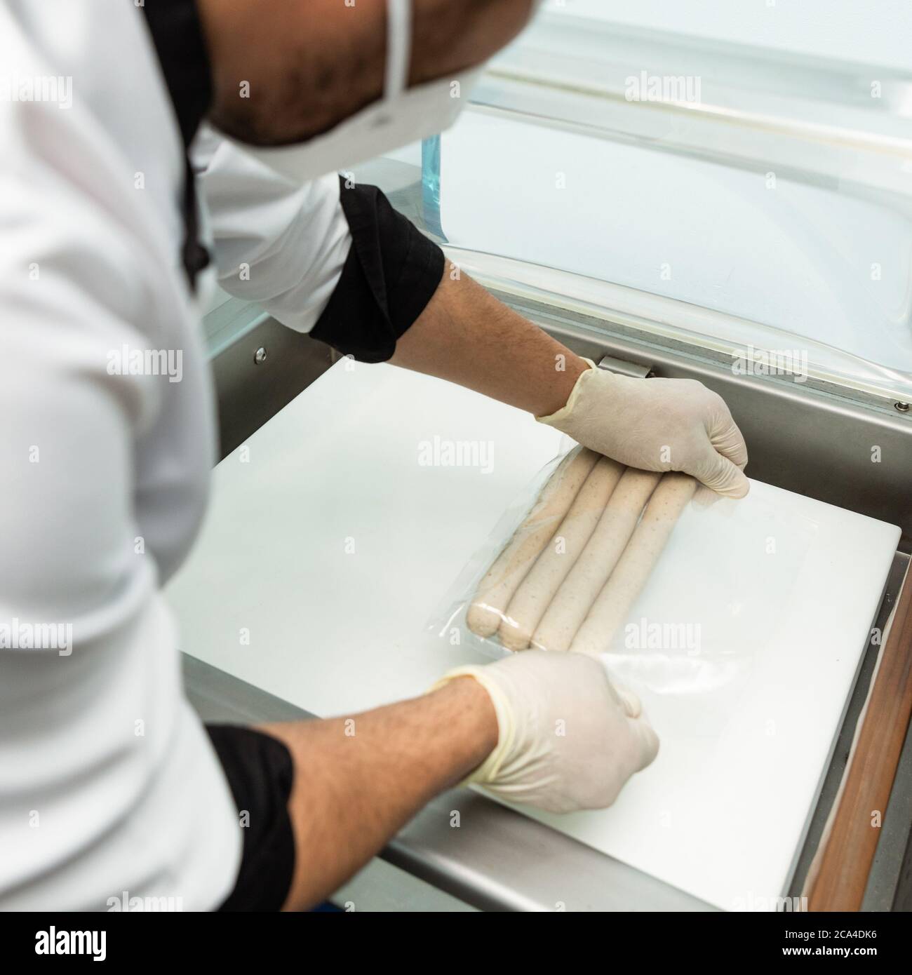 Making vacuum sausage process Stock Photo Alamy