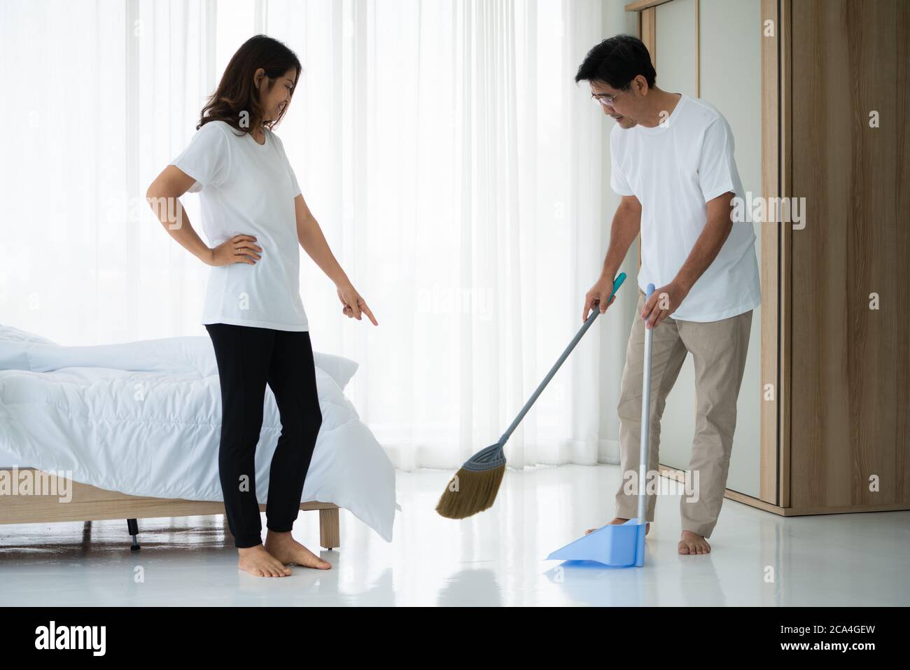 Chinese woman cleaning house hi-res stock photography and images - Alamy