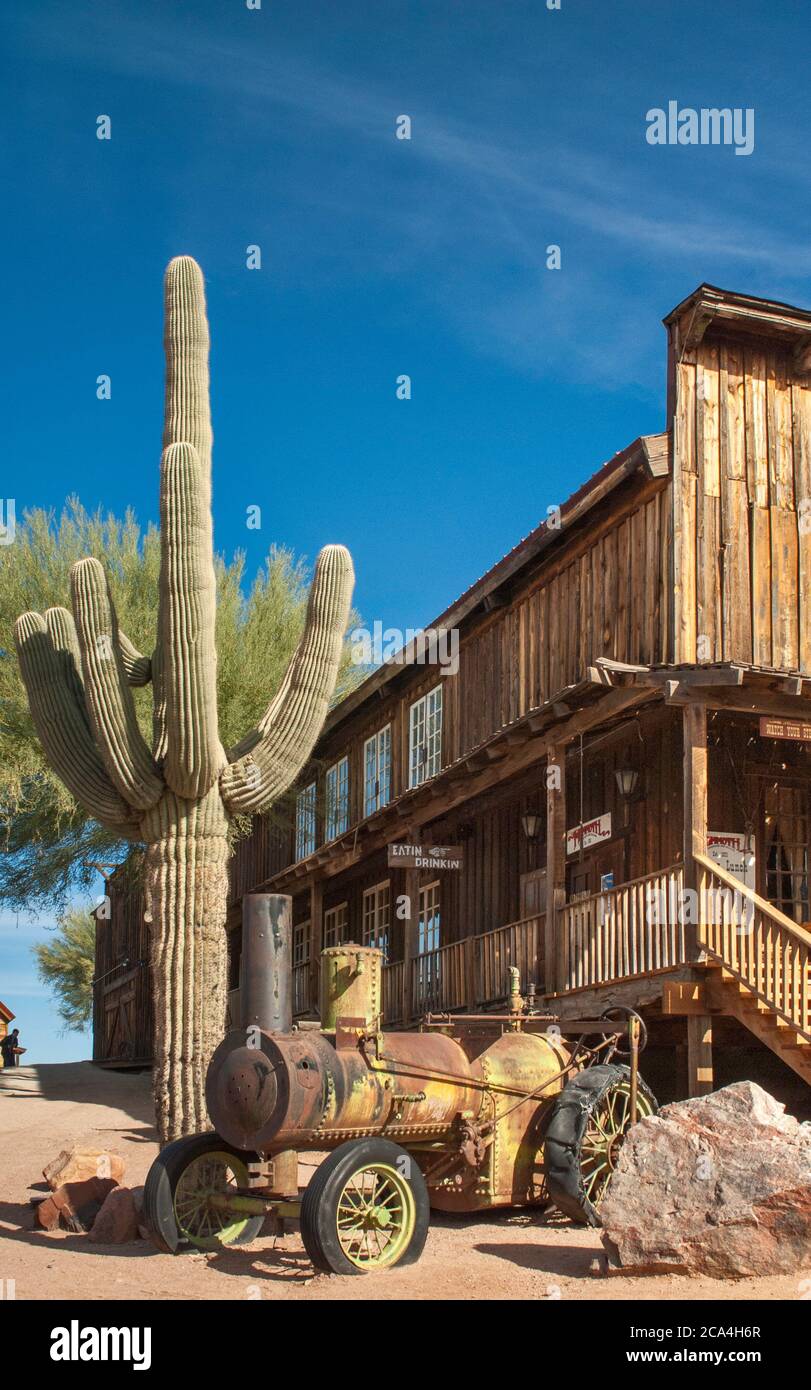 Steampowered traction engine, 19th century tractor, at street in ghost