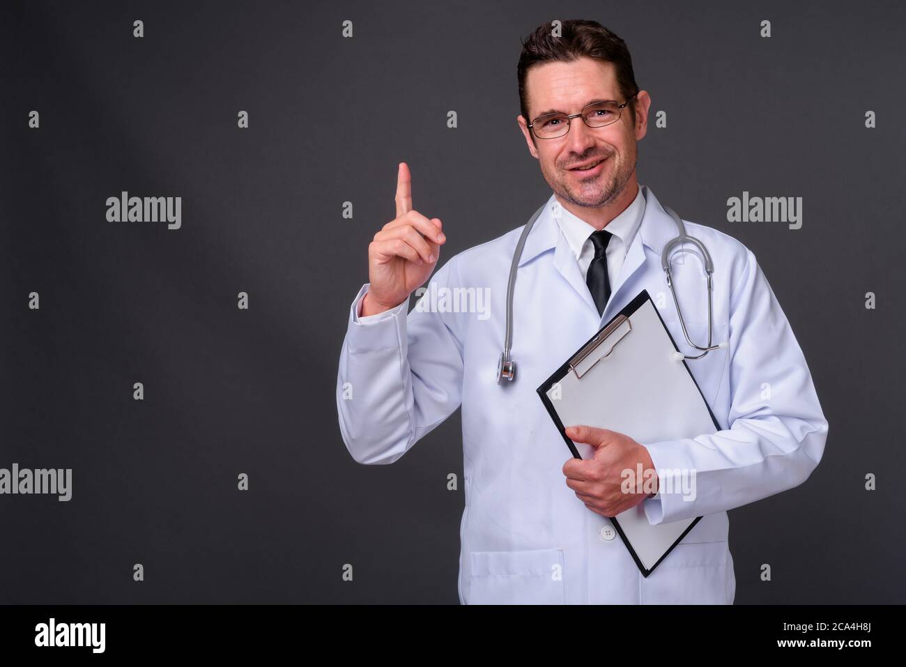 Handsome doctor stethoscope hi-res stock photography and images - Alamy