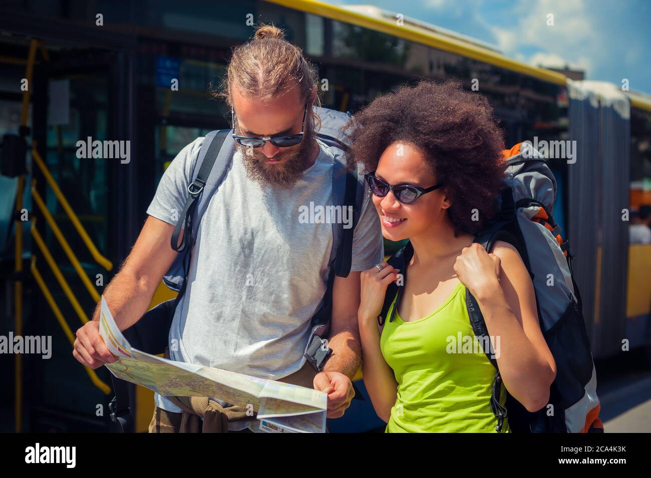 Handsome young backpacker map hi-res stock photography and images - Alamy