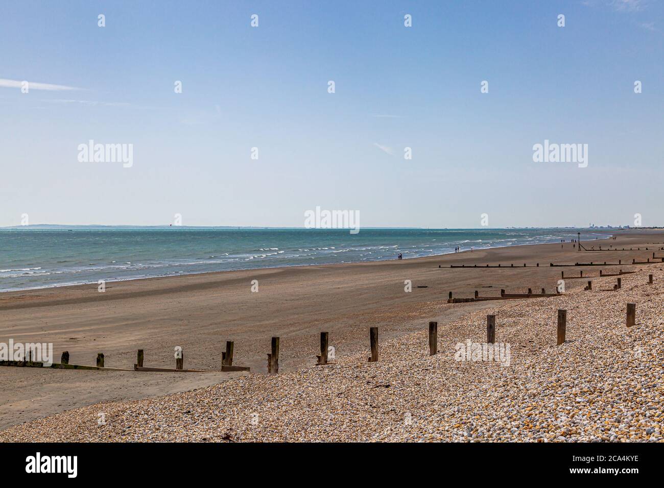 East Wittering Beach In West Sussex On A Sunny Summers Day Stock Photo east-wittering-beach-in-west-sussex-on-a-sunny-summers-day-stock-photo