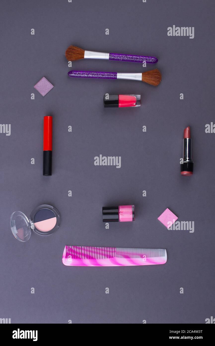 Make-up accessories on a grey background and copy space. Stock Photo