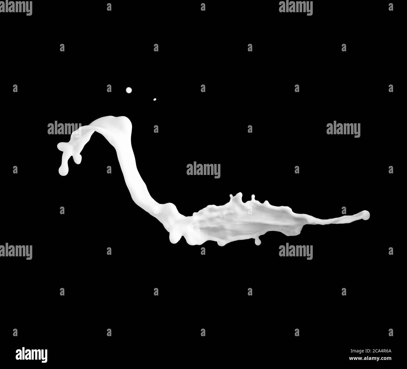 Milk splash isolated on black background Stock Photo - Alamy