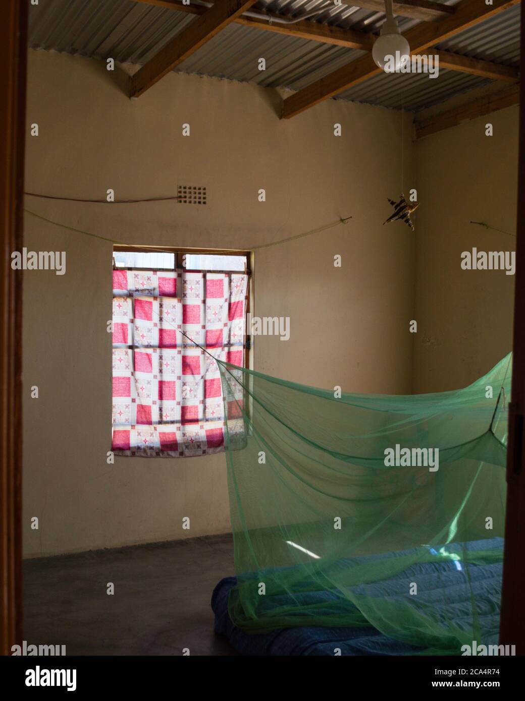 Guest Bedroom inside Countryside Home in Kachikau, Botswana, Africa Stock Photo