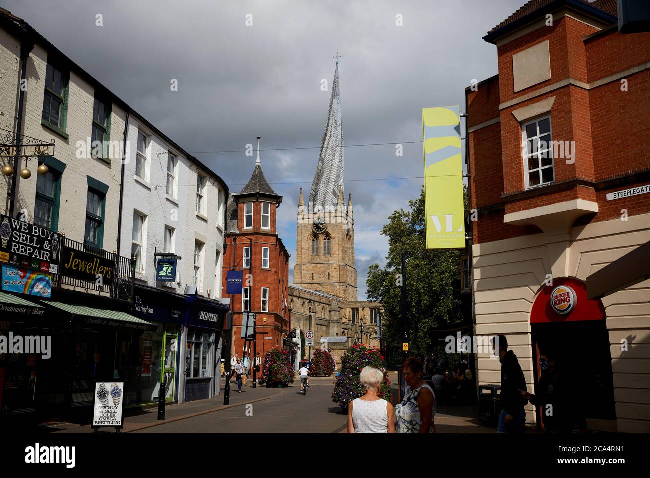 Chesterfield town centre in Derbyshire landmark Chesterfield Parish Church with iconic crooked spire from Burlington Street Stock Photo