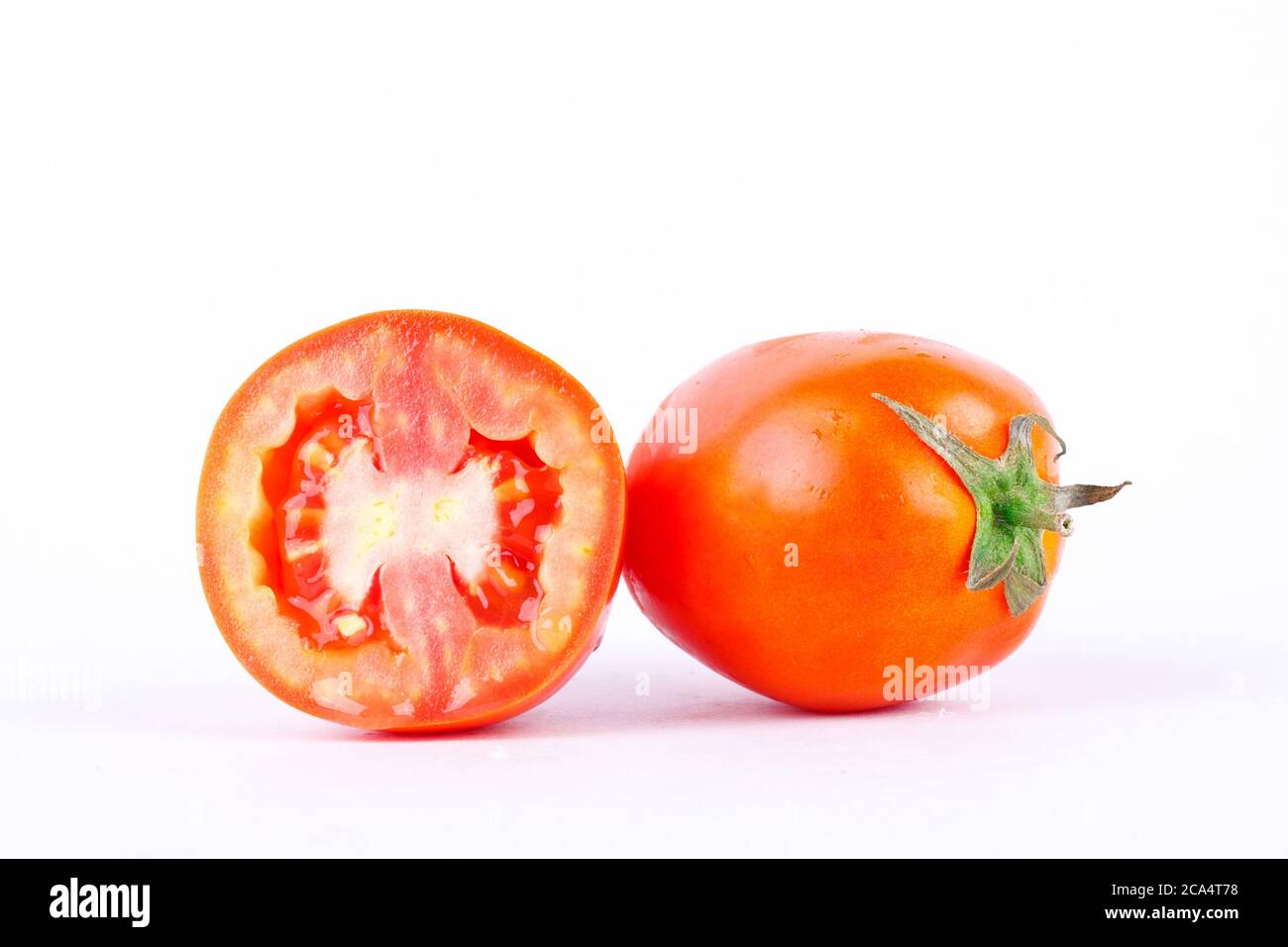 Red tomato is high in vitamin C vegetables fruit on the white background isolated Stock Photo