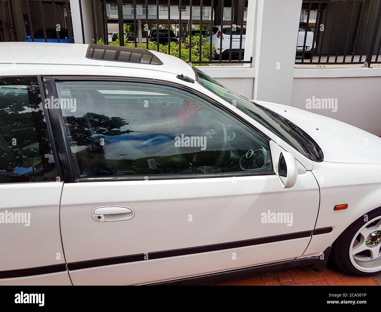 Small white car in Claremont Newlands, Cape Town, South Africa Stock