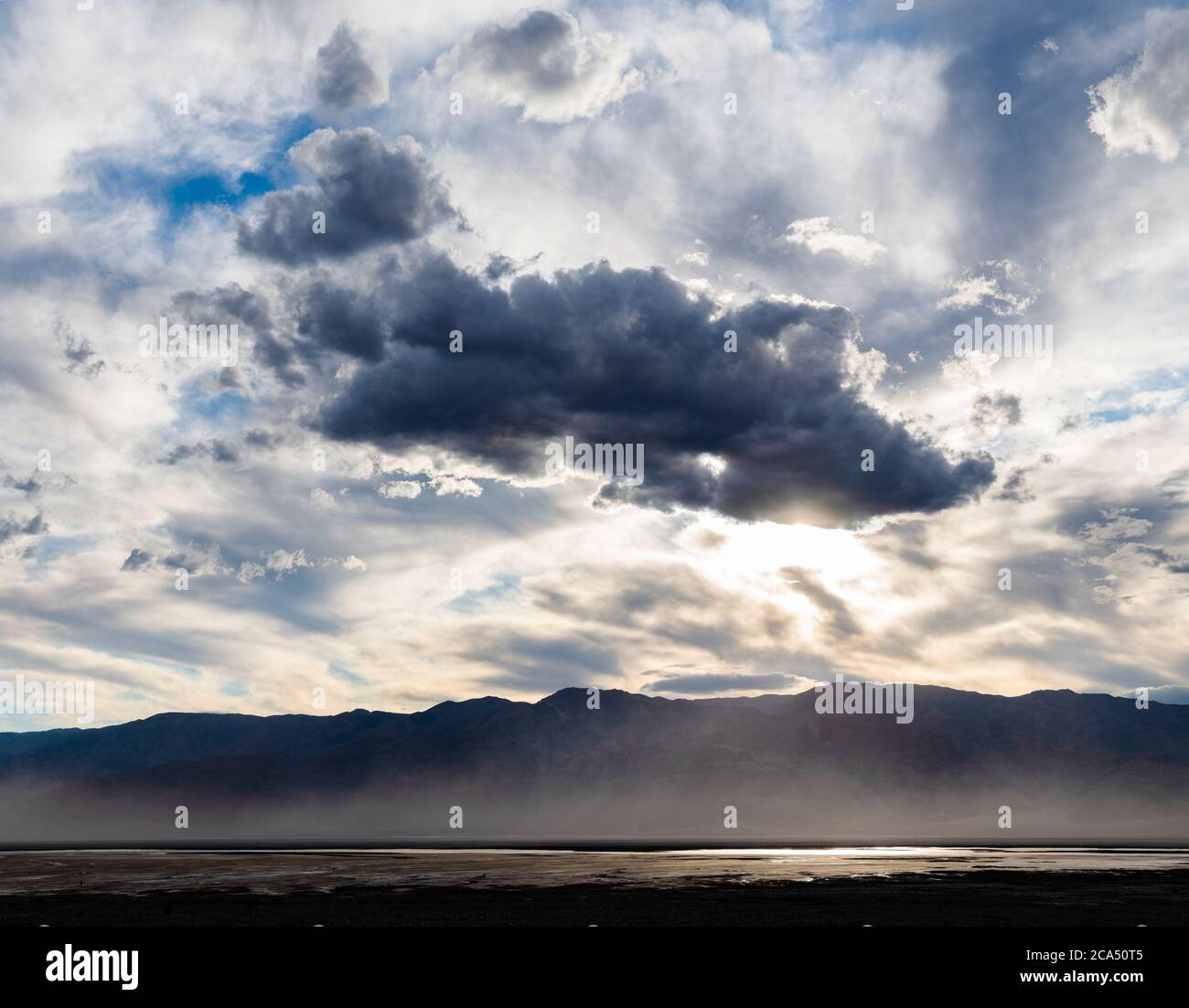 View of dust storm at sunset, salt flat, Death Valley National Park, California, USA Stock Photo