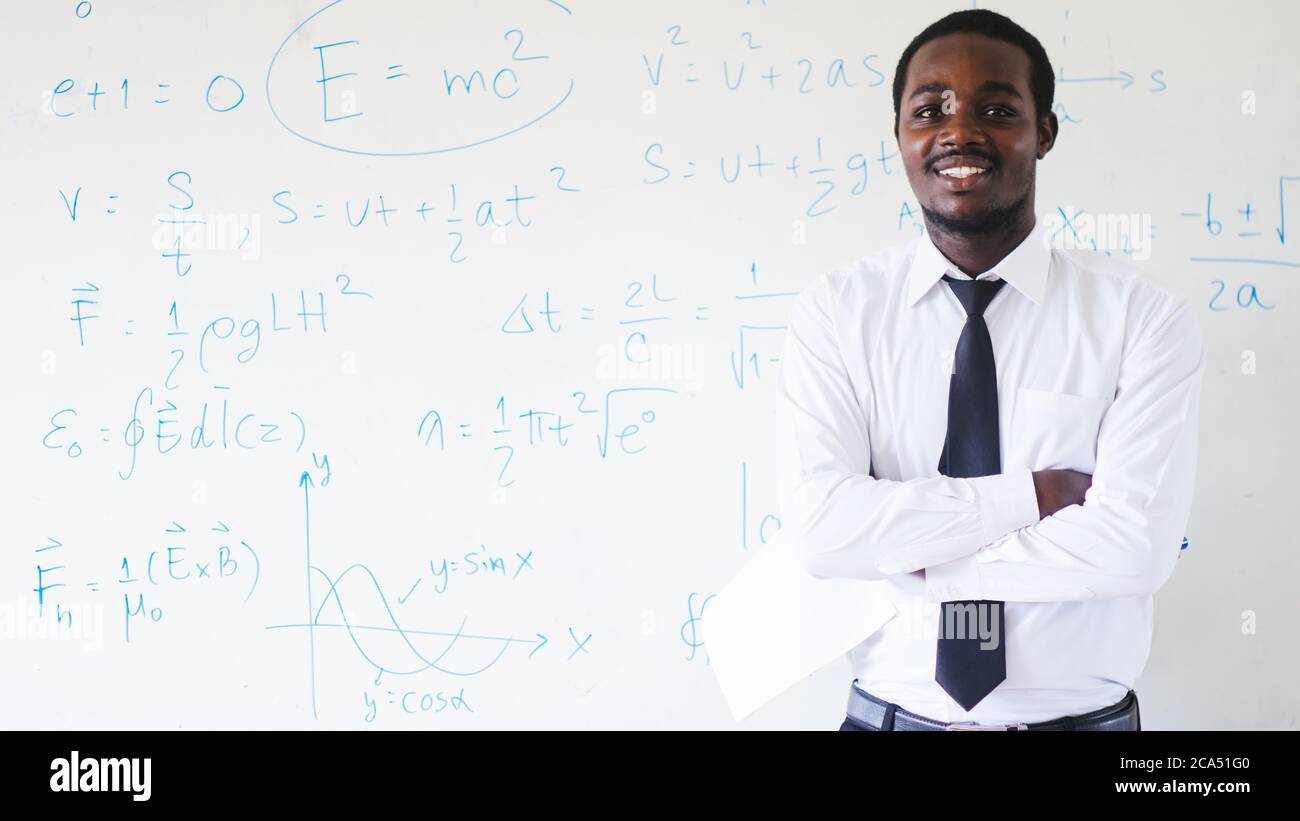 African teacher teaching science in the classroom Stock Photo