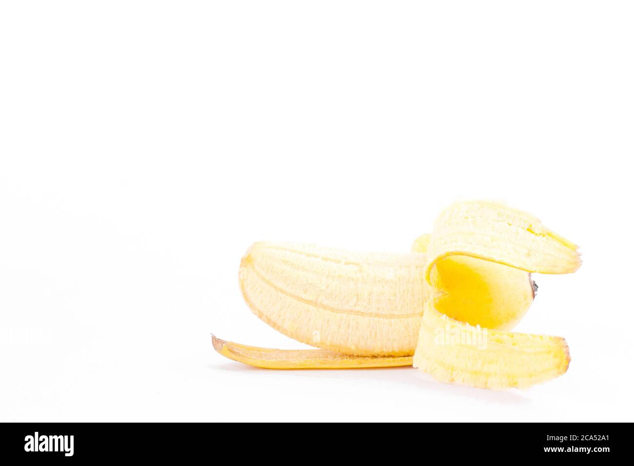 peeled egg banana on white background healthy Pisang Mas banana fruit food isolated Stock Photo