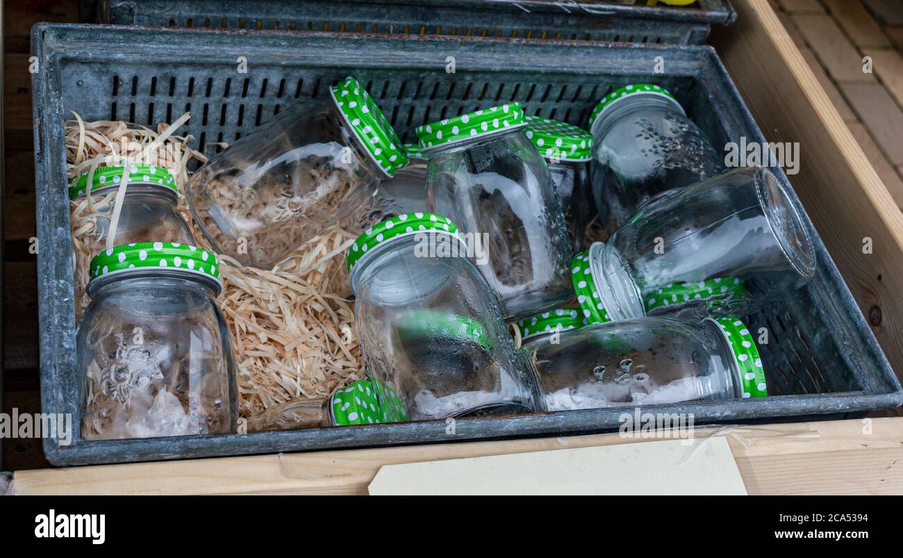 decorative glass jars with a lid on sale, a jar with an iron lid in a